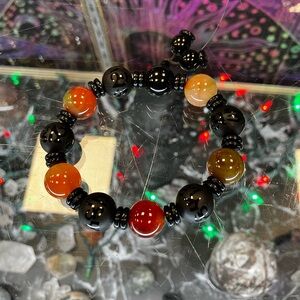 Elegant Black and Orange Beaded Bracelet